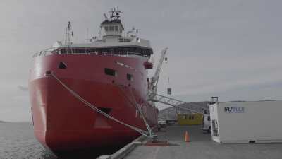 Loading of the French Navy polar patrol and supply icebreaker l'Astrolabe before a trip to Antarctica
