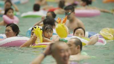 The overcrowded city wave swimming pool