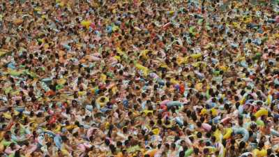 The overcrowded city wave swimming pool