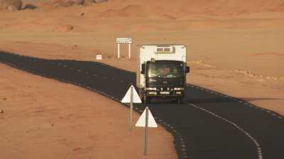 Saharan road crossing the desert