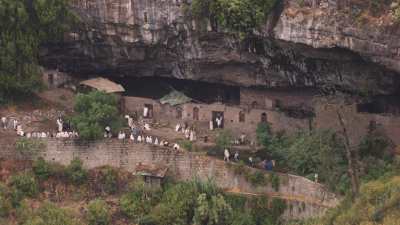 Christians going to the Naktala cave church