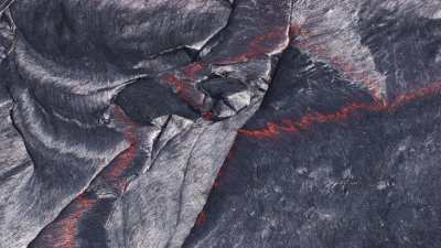 Very close shots of the lava lake and the red-hot lava lying underneath