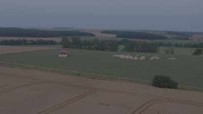 Air balloon landing in a field