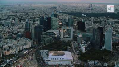 The triumphal way from the business district of Paris La Defense with the Grande Arche up to Paris