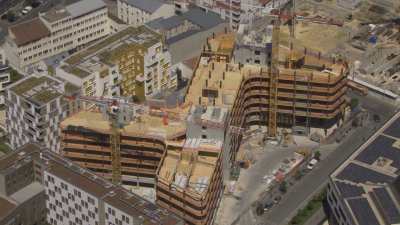 The school Casares rue Cristino Garcia + Wooden office building under construction in Saint-Denis