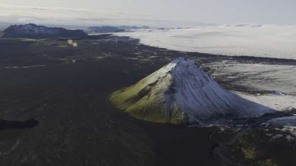 The snow-capped Maelifel volcanic cone