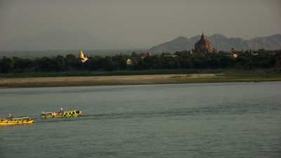 Bagan temples, tourist and fishing boats