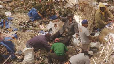 Recyclers working in Mexico city landfill, today closed