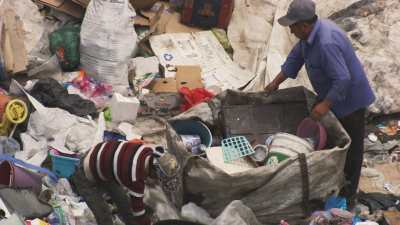 Recyclers working in Mexico city landfill