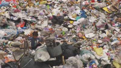 Recyclers working in Mexico city landfill