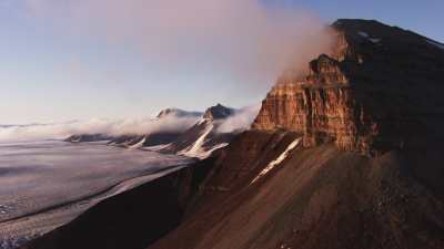 Svalbard, peaks and valley in the mist
