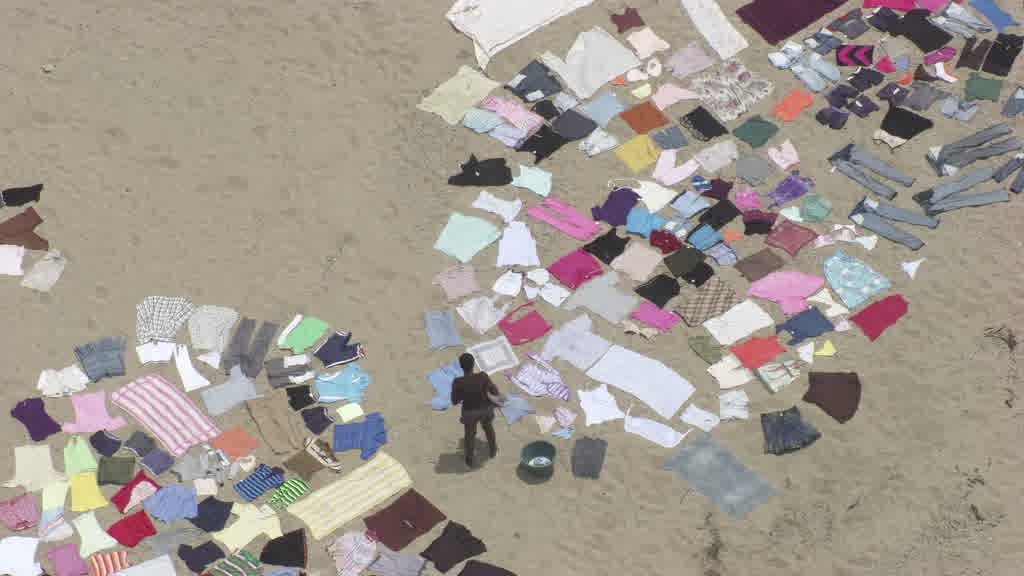 Séchage du linge sur la rivière entre Haiti et la République Dominicaine