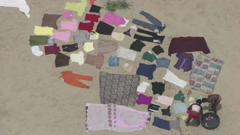 Séchage du linge sur la rivière entre Haiti et la République Dominicaine