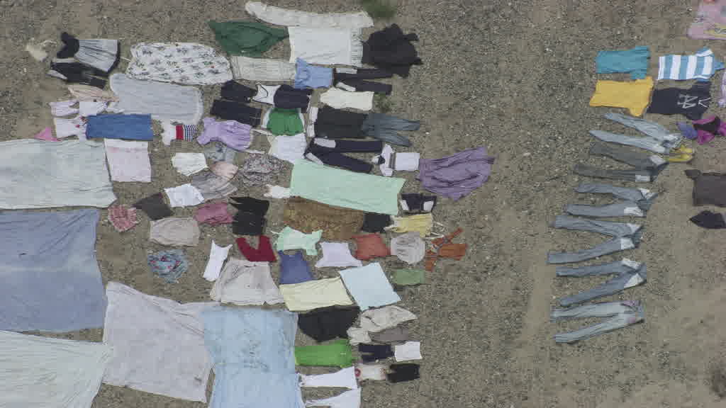 Séchage du linge sur la rivière entre Haiti et la République Dominicaine