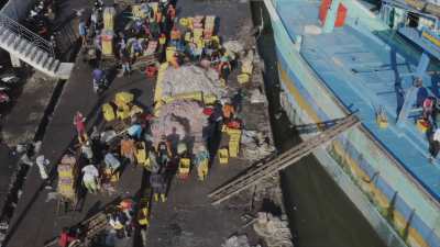 Fishing harbour and activities on the North shore of Java