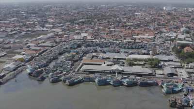 Fishing harbour and activities on the North shore of Java